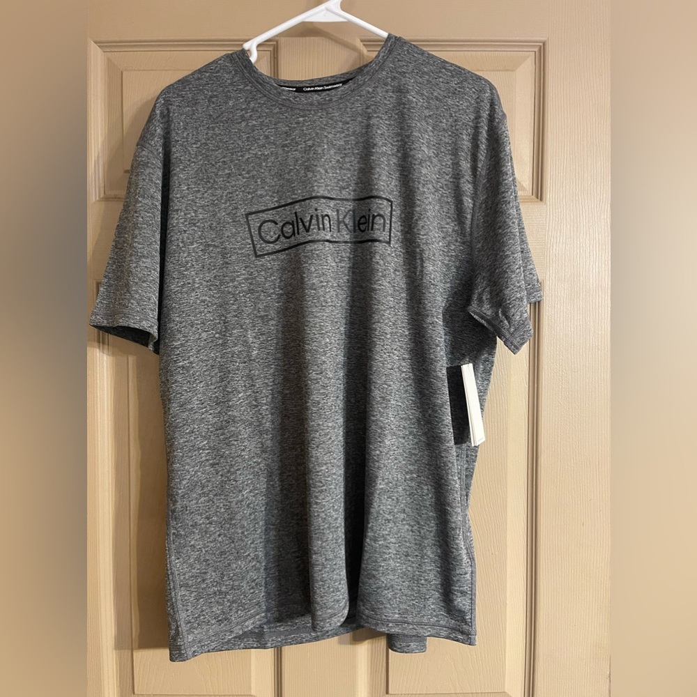 Brand new steel with tags, Calvin Klein swimwear, T-shirt, size XL.